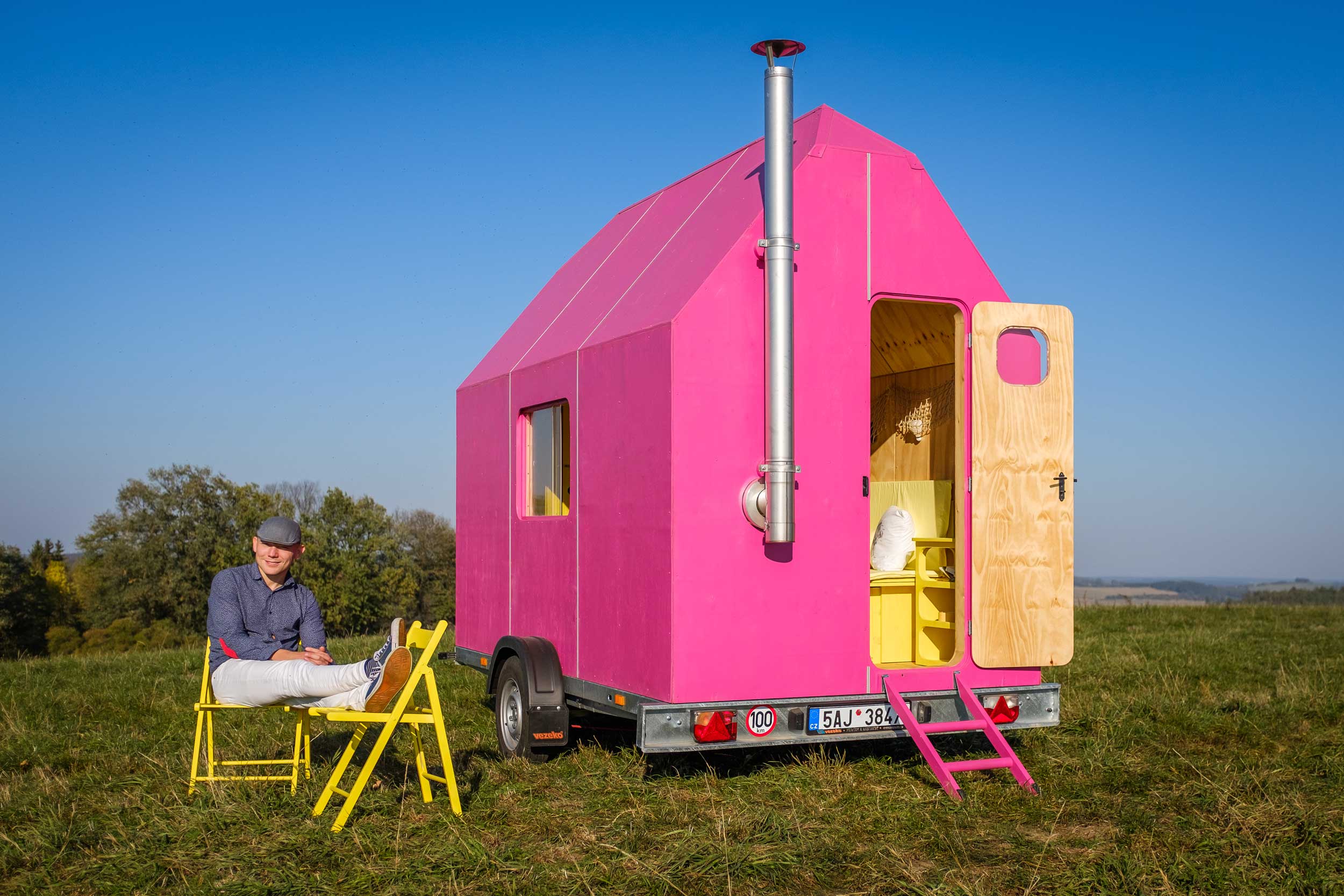 bright-pink-tiny-home-designed-to-free-buyers-of-mortgages-builder